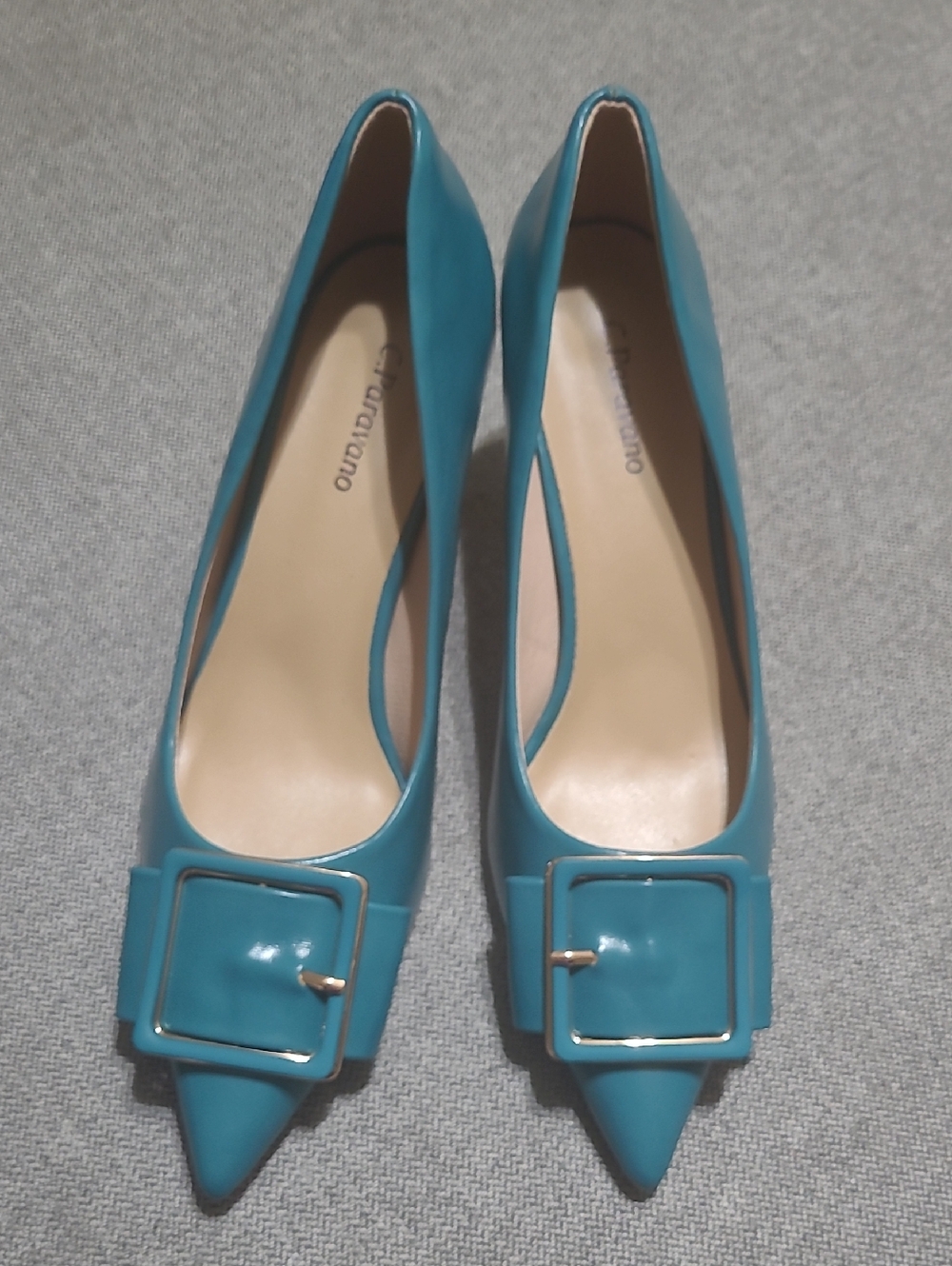 C. Paravano Buckle Heels